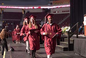 Students Walking at Graduation